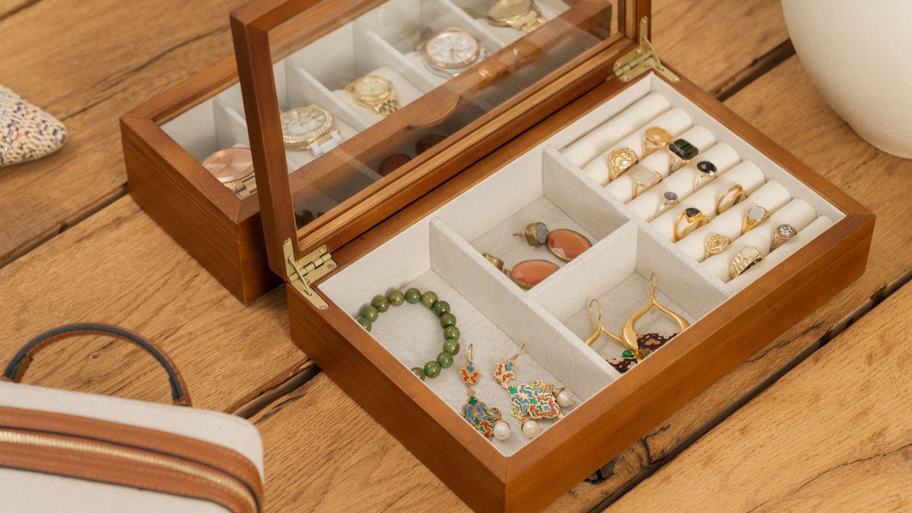 Building a fine jewelry collection l Free A display of jewelry on a table Stock Photo